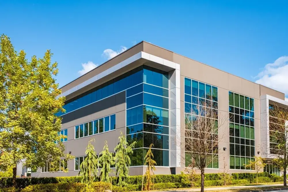 Office building with beige exterior panels and white trim by a painting company in Mill Valley, CA