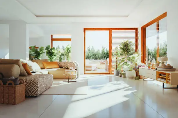 Living room with warm white wall paint, crisp white ceiling, and orange door trim by an interior painter in Novato, CA.