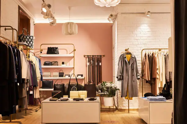 Retail store with warm peach walls and white brick finishes by an interior painter in Marin County, CA.